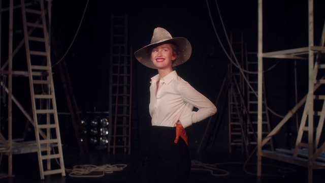 Video Reference: Performance, Hat, Headgear, Event, Performing arts, Fashion accessory, Performance art, Stage, Person