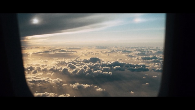 Video Reference: sky, atmosphere, cloud, daytime, horizon, sunlight, meteorological phenomenon, earth, cumulus, air travel, Person