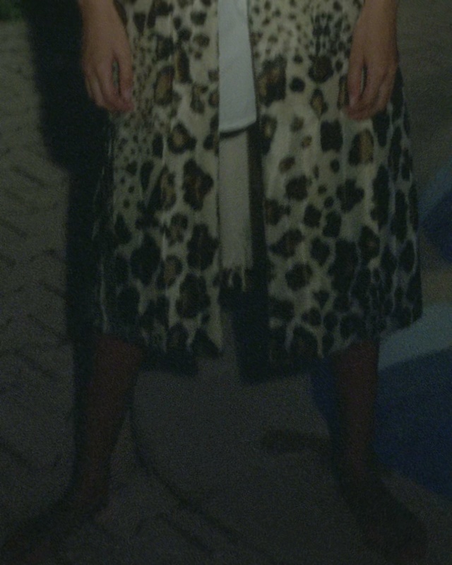 Video Reference: Black, Clothing, Dress, Brown, Leg, Footwear, Outerwear, Joint, Fun, Human leg