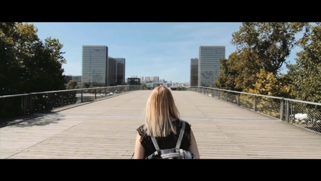 Video Reference: photograph, urban area, mode of transport, infrastructure, walkway, sky, boardwalk, snapshot, city, photography, Person