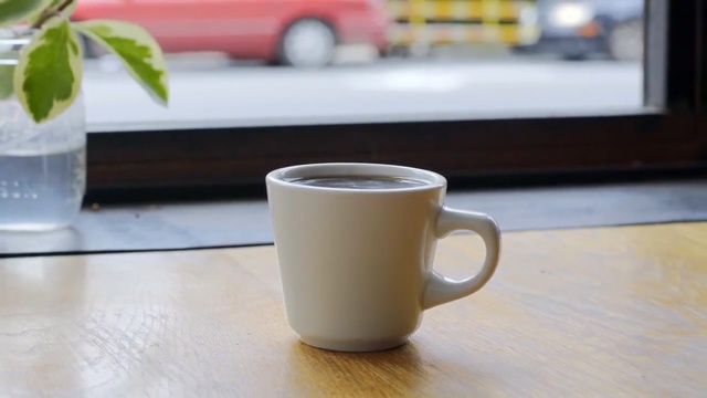Video Reference: Cup, Coffee cup, Cup, Drinkware, Mug, Tableware, Ceramic, Table, Serveware, Porcelain
