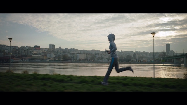 Video Reference: sky, water, urban area, cloud, morning, photography, reflection, grass, tree, recreation, Person