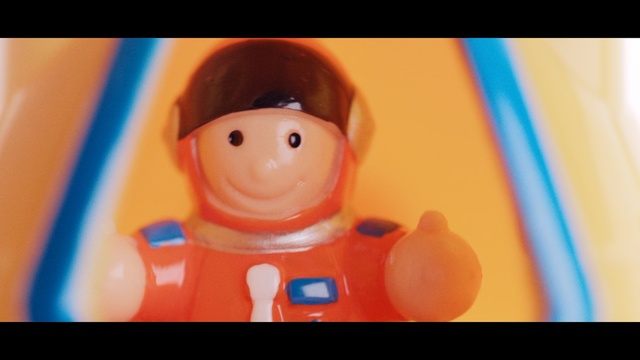 Video Reference: Toy, Cartoon, Orange, Figurine, Child, Action figure, Smile, Fictional character, Lego, Illustration, Person