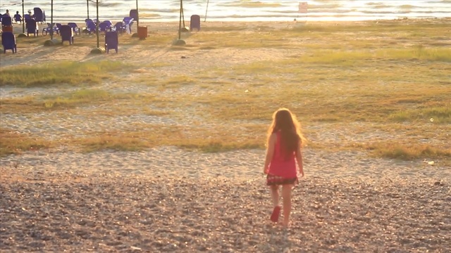 Video Reference: sand, girl, sunlight, grass, summer, vacation, ecoregion, sky, landscape, grass family, Person