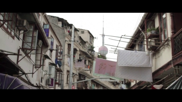 Video Reference: Neighbourhood, Residential area, Snapshot, Architecture, Urban area, Mode of transport, Facade, Metropolis, Suburb, Street