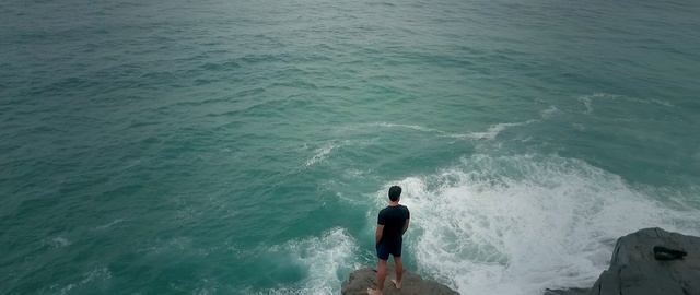 Video Reference: sea, water, wave, coastal and oceanic landforms, wind wave, ocean, coast, terrain, cliff, sky, Person