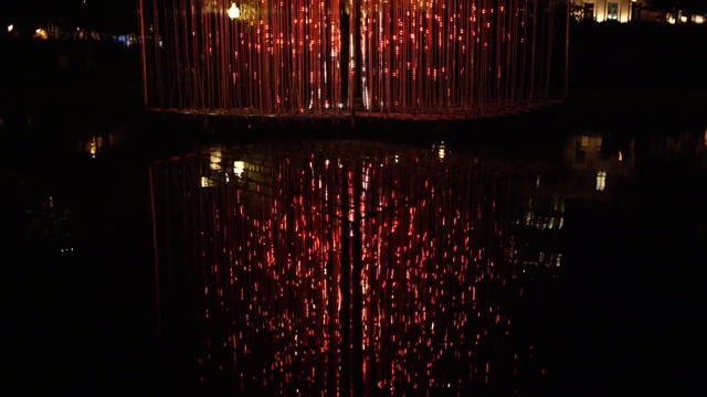 Video Reference: darkness, night, reflection, light, lighting, entertainment, light fixture, fête, event, midnight