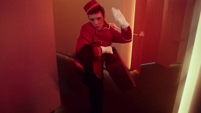 Video Reference: Red, Pink, Leg, Selfie, Joint, Room, Photography, Headgear, Smile, Sitting