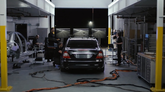 Video Reference: car, motor vehicle, automobile repair shop, vehicle, automotive design, service, automotive exterior, factory, compact car, machine