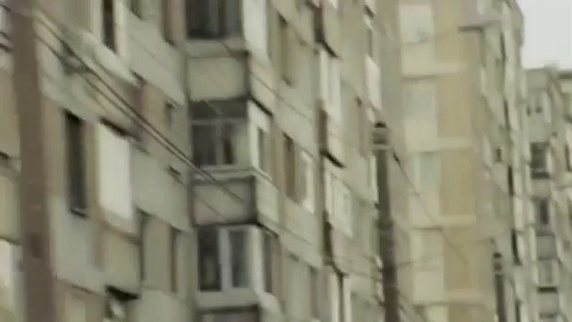 Video Reference: Architecture, Building, Facade, Metropolis, Property, Wall, Commercial building, Apartment, Neighbourhood, Metropolitan area, Person