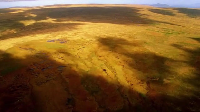 Video Reference: Natural environment, Hill, Atmosphere, Tundra, Plain, Ecoregion, Sky, Horizon, Sunlight, Grassland