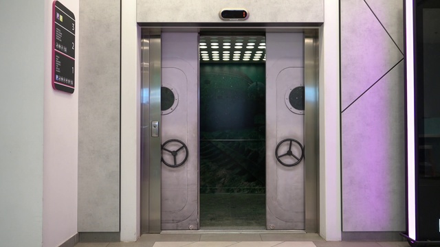 Video Reference: Door, Elevator, Architecture, Restroom, Building, Facade, Symmetry, Gate