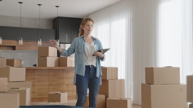 Video Reference: furniture, standing, table, floor, interior design, flooring, product, Person