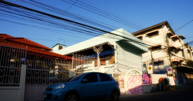 Video Reference: car, sky, residential area, house, neighbourhood, property, building, town, urban area, architecture