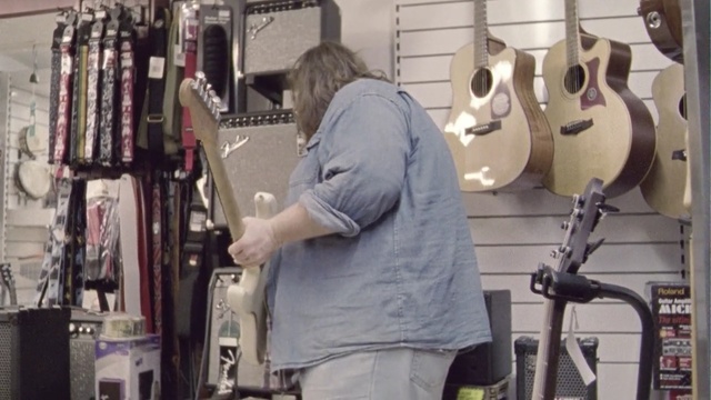 Video Reference: musical instrument, guitar, plucked string instruments, string instrument, string instrument, product, Person