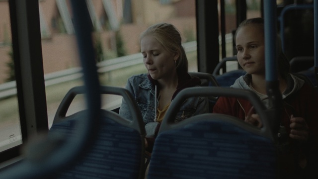 Video Reference: Passenger, Mode of transport, Transport, Lady, Human, Sitting, Public transport, Vehicle, Photography, Auto part, Person