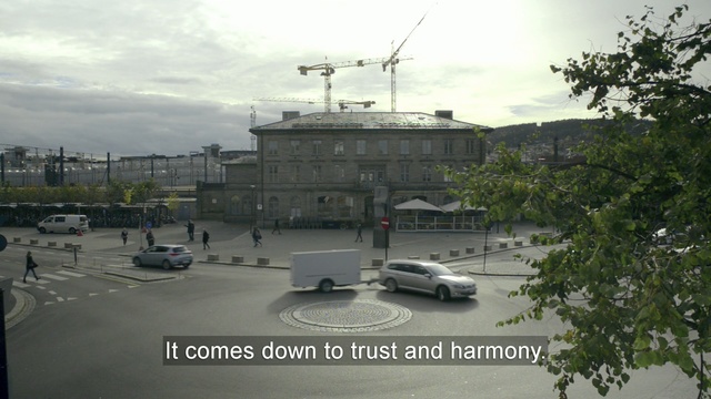 Video Reference: sky, vehicle, city, tree, suburb