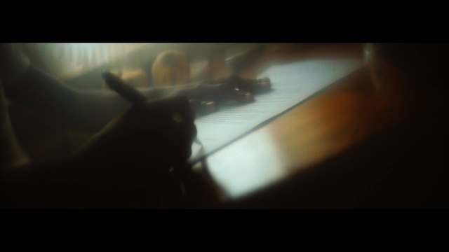 Video Reference: Black, Light, Darkness, Snapshot, Brown, Sky, Shadow, Photography, Lens flare, Dark, Looking, Computer, Laptop, Screen, Sitting, Table, Close, Monitor, Cat, Desk, Keyboard, Cake, Room, White, Laying, Aquarium, Swimming, Image