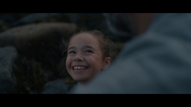 Video Reference: Face, Photograph, Black, Facial expression, Head, Skin, Nose, Cheek, Smile, Child