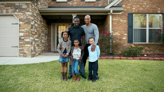 Video Reference: people, photograph, house, home, backyard, yard, family, lawn, grass, tree, Person