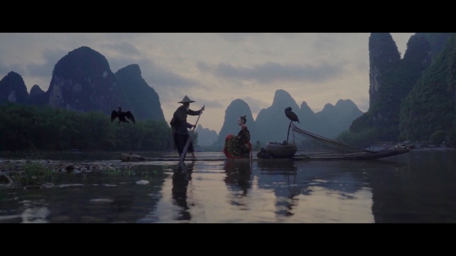 Video Reference: waterway, water, screenshot, river, atmosphere, sky, reflection, lake, mountain, fjord, Person