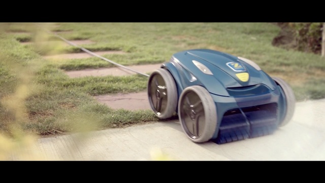Video Reference: Motor vehicle, Vehicle, Automotive design, Lawn, Outdoor power equipment, Grass, Lawn mower, Car, Wheel, Technology