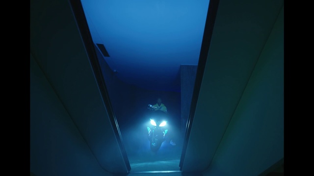 Video Reference: Blue, Light, Turquoise, Sky, Aqua, Azure, Electric blue, Lighting, Atmosphere, Architecture, Indoor, Table, Computer, Monitor, Laptop, Sitting, Desk, Small, Dark, Screen, Television, Keyboard, White, Large, Counter, Lit, Black, Room, Desktop, Standing, Display, Refrigerator, Mouse, Kitchen, Man, Phone, Screenshot, Electronics, Text