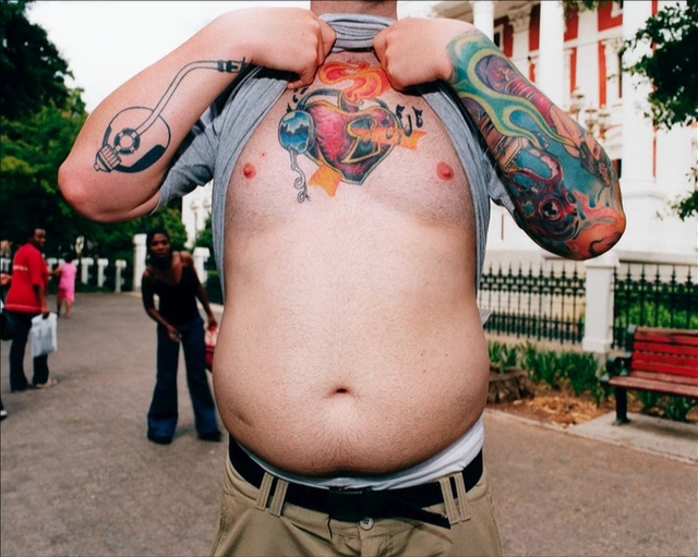 Video Reference: tattoo, joint, shoulder, arm, trunk, abdomen, human body, muscle, chest, neck, Person