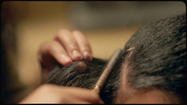 Video Reference: Hair, Hairstyle, Eyebrow, Close-up, Forehead, Hand, Snout, Finger, Black hair, Ear