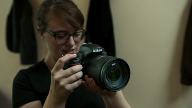 Video Reference: cameras & optics, camera, digital camera, single lens reflex camera, photographer, digital slr, reflex camera, camera lens, photography, camera accessory, Person