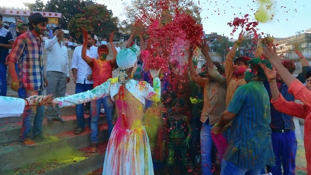 Video Reference: festival, carnival, crowd, fun, event, tradition, temple, ritual, tree, fête, Person