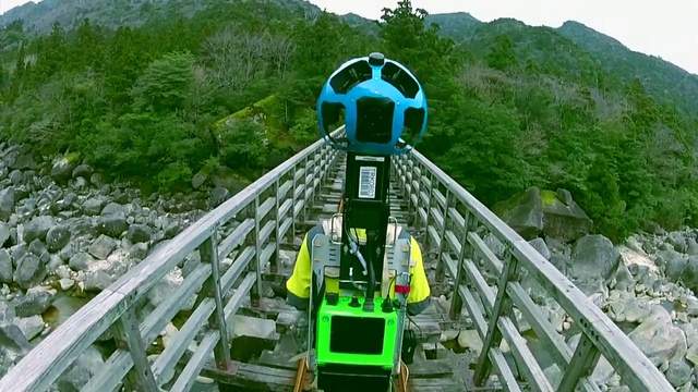 Video Reference: Transport, Rolling stock, Cable car, Vehicle, Amusement park, Funicular, Amusement ride, Nonbuilding structure, Tourist attraction, Thoroughfare