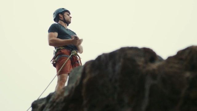 Video Reference: adventure, recreation, sky, rope, rock climbing equipment, rock, Person