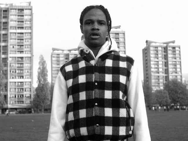 Video Reference: White, Photograph, Black, Plaid, Standing, Black-and-white, Pattern, Human settlement, Urban area, Design