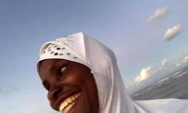Video Reference: White, Head, Headgear, Sky, Photography, Turban, Landscape, Cap, Fashion accessory, Happy