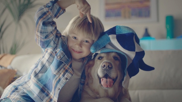 Video Reference: blue, skin, mammal, dog, vertebrate, dog like mammal, girl, fun, dog breed, child, Person