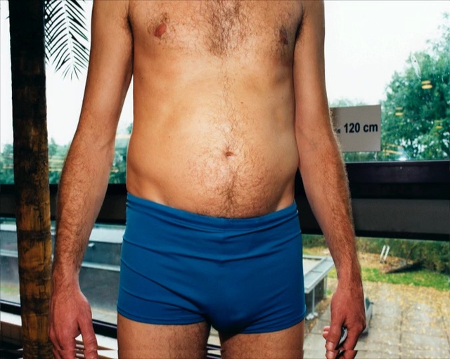 Video Reference: man, barechestedness, abdomen, male, briefs, shoulder, muscle, shorts, trunk, undergarment, Person