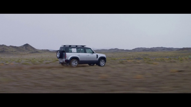 Video Reference: Land vehicle, Vehicle, Car, Off-roading, Sand, Natural environment, Off-road vehicle, Desert, Landscape, Automotive tire