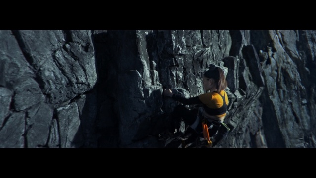 Video Reference: Adventure, Climbing, Recreation, Tree, Formation, Screenshot, Darkness, Abseiling, Caving, Cave, Rock, Sitting, Photo, Black, Orange, Yellow, Man, Dark, Young, Colorful, Covered, Riding, Doing, Holding, Standing, Board, Room, Cat, Laying, Video game, Hiking, Stone