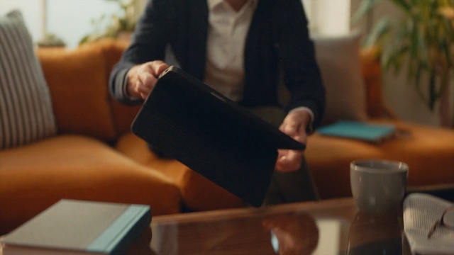 Video Reference: Leg, Table, Hand, Room, Furniture, Sitting, Finger, Reading, Interior design