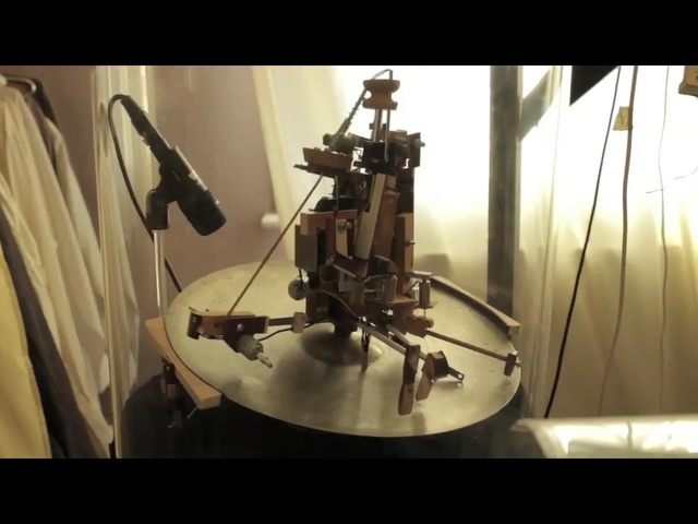 Video Reference: string instrument, percussion, tom tom drum, machine, musical instrument, weapon