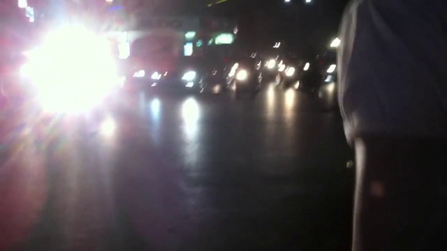 Video Reference: Black, Darkness, Photograph, Light, Automotive lighting, Lighting, Street light, Night, Reflection, Mode of transport