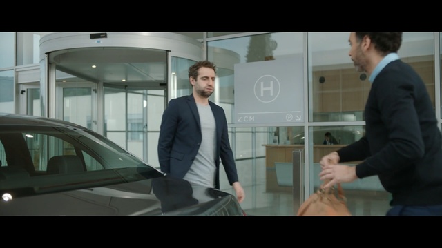 Video Reference: Vehicle door, Automotive design, Suit, Gentleman, Luxury vehicle, Snapshot, Automotive exterior, Standing, White-collar worker, Person