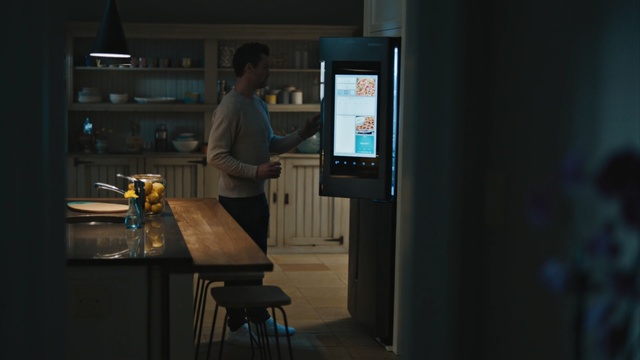 Video Reference: Standing, Technology, Electronic device, Room, Night, Restaurant, Person