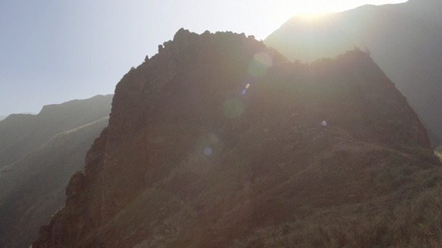 Video Reference: ridge, mountainous landforms, sky, mountain, mountain range, highland, hill station, terrain, geological phenomenon, escarpment