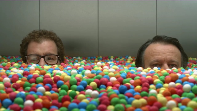 Video Reference: ball pit, fun, play, toy, child, leisure, sweetness, sprinkles, Person