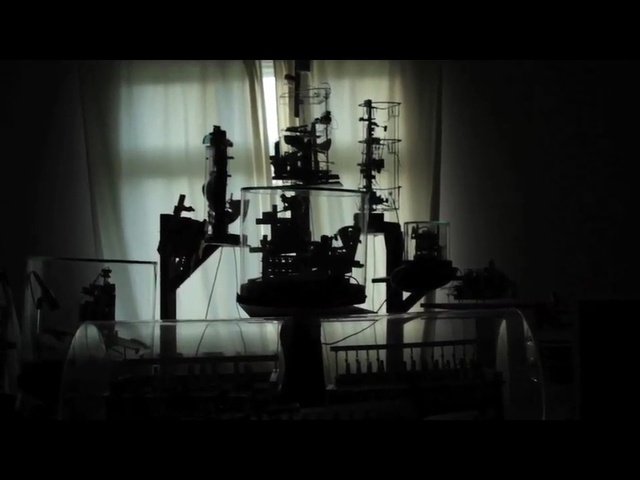 Video Reference: darkness, black and white, musical instrument, monochrome, drums, percussion, tom tom drum, midnight, string instrument, Person