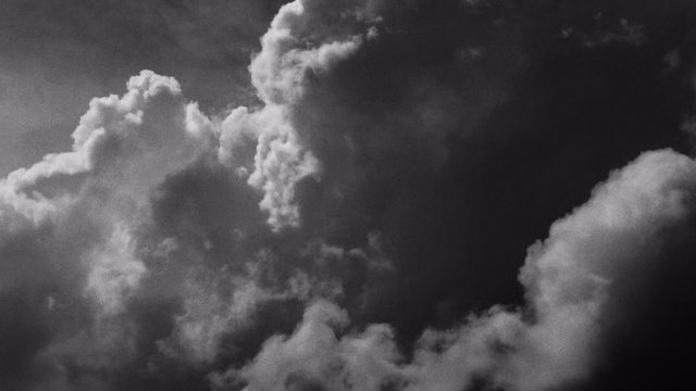 Video Reference: Sky, Cloud, Cumulus, White, Atmosphere, Daytime, Atmospheric phenomenon, Black-and-white, Meteorological phenomenon, Monochrome photography, Person