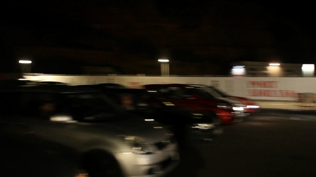 Video Reference: car, night, vehicle, mode of transport, darkness, automotive design, motor vehicle, automotive lighting, traffic, driving