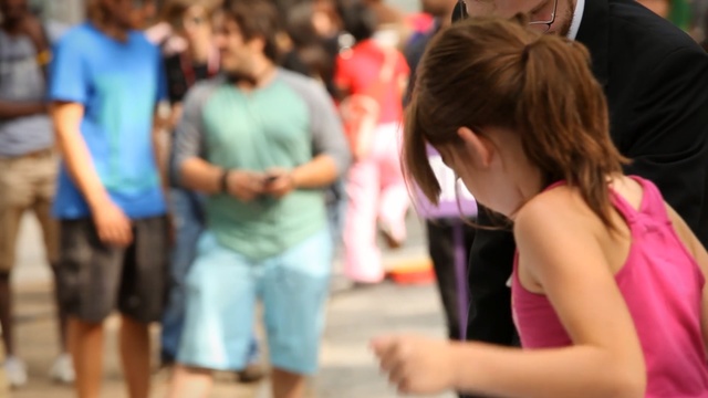 Video Reference: youth, girl, community, fun, interaction, child, crowd, student, leisure, Person